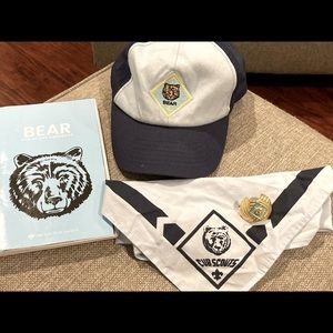 Bear Cub Scout hat, neckerchief, slide and handbook